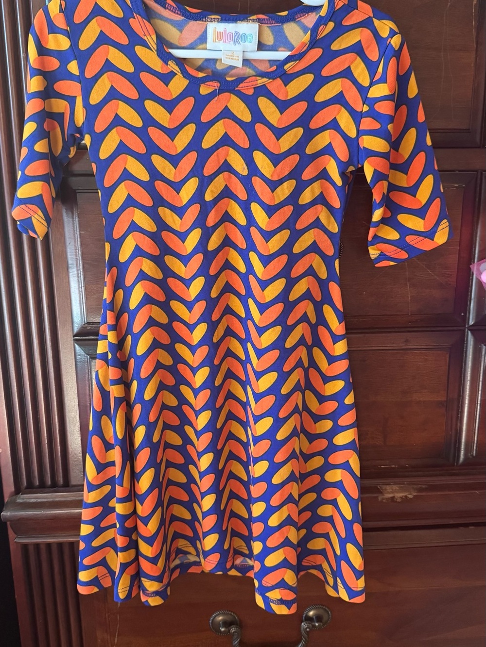 LuLaRoe Kids Dress in Navy with Orange and Yellow Hearts Print